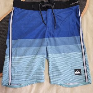 Boardshorts by Quiksilver, blue faded stripes, 27 waist